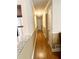 Hallway with views of the Kitchen and Bedrooms at 4567 Duncan Dr, Sugar Hill, GA 30518