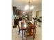 Eat-in kitchen and dining area with stainless steel appliances and bar seating at 4567 Duncan Dr, Sugar Hill, GA 30518