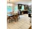 Eat-in kitchen and dining area with stainless steel appliances and ample counter space at 4567 Duncan Dr, Sugar Hill, GA 30518