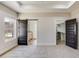 Bright main bedroom with ensuite bathroom and spacious walk-in closet at 1270 Sandhill Hulett Rd, Villa Rica, GA 30180