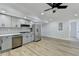 Beautiful kitchen with stainless steel appliances and modern gray cabinetry at 1591 Autumn Hurst Trl, Stone Mountain, GA 30088