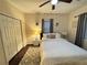 Bedroom with a ceiling fan, window, closet and hardwood floors with an area rug at 24 Moreland Ne Ave, Atlanta, GA 30307