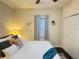 Cozy bedroom featuring a ceiling fan, natural light, and a closet for storage at 24 Moreland Ne Ave, Atlanta, GA 30307