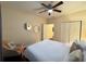 Bright bedroom features a ceiling fan, closet, and round mirrors accenting the walls at 24 Moreland Ne Ave, Atlanta, GA 30307
