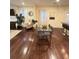 A living room and dining area are combined in an open space with modern decorations and furniture at 24 Moreland Ne Ave, Atlanta, GA 30307