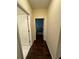 Hallway with hardwood flooring leading to the bathroom and bedroom at 24 Moreland Ne Ave, Atlanta, GA 30307