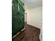 Hallway showcasing gleaming hardwood floors and neutral wall color at 24 Moreland Ne Ave, Atlanta, GA 30307