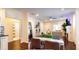 A living room and dining area are combined in an open space with modern decorations and furniture at 24 Moreland Ne Ave, Atlanta, GA 30307