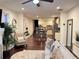 Open concept living area featuring hardwood floors, ceiling fan and a kitchen view at 24 Moreland Ne Ave, Atlanta, GA 30307
