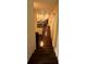 Stairway transitioning to a living space featuring hardwood floors, kitchen and a living room at 24 Moreland Ne Ave, Atlanta, GA 30307