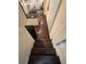 View of the stairway leading to living spaces with hardwood floors and a glimpse of the living room at 24 Moreland Ne Ave, Atlanta, GA 30307