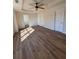 Bedroom featuring beautiful hardwood floors, recessed ceilings, and several doorways at 602 Birch River Ln, Lawrenceville, GA 30043