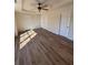 Bedroom featuring beautiful hardwood floors and recessed ceilings at 602 Birch River Ln, Lawrenceville, GA 30043