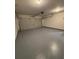 Spacious two-car garage with epoxy flooring and automatic door at 602 Birch River Ln, Lawrenceville, GA 30043