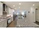 Modern kitchen featuring granite countertops, stainless steel appliances, and open layout at 2051 Glenview Park Cir, Duluth, GA 30097