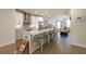 Bright, open kitchen featuring granite countertops, stainless steel appliances, and eat-in island at 2051 Glenview Park Cir, Duluth, GA 30097
