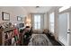 Cozy home office with a built-in desk, patterned rug, and a door leading to the outside at 2051 Glenview Park Cir, Duluth, GA 30097