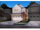 Charming new construction townhome with a two-car garage and professionally landscaped yard at 4629 Electric Ave, Mableton, GA 30126