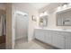 Clean bathroom with double sink vanity and a tiled shower room at 4901 Pleasantry Nw Way, Acworth, GA 30101