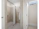 Tiled shower room with a glass door and a shower curtain rod at 4901 Pleasantry Nw Way, Acworth, GA 30101