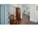 Foyer area that showcases hardwood floors and a glimpse of the spacious living area at 4901 Pleasantry Nw Way, Acworth, GA 30101