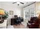 Office area boasts neutral colors, shutters, and a comfortable leather chair at 4901 Pleasantry Nw Way, Acworth, GA 30101