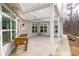 Covered patio with louvered pergola, ceiling fans, concrete flooring, and a raised garden bed at 4901 Pleasantry Nw Way, Acworth, GA 30101