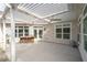Spacious outdoor patio with a louvered pergola, ceiling fans, and a convenient gardening station at 4901 Pleasantry Nw Way, Acworth, GA 30101