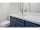 Cozy bathroom featuring a marble countertop, and a blue vanity at 4051 Ridgehurst Se Dr, Smyrna, GA 30080