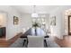 Dining room featuring a dark wood table, neutral decor and windows at 4051 Ridgehurst Se Dr, Smyrna, GA 30080