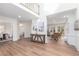 Bright and open living room with hardwood floors, large windows, and neutral decor at 4051 Ridgehurst Se Dr, Smyrna, GA 30080