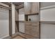 Spacious walk-in closet with custom wood shelving and drawers provides ample storage for clothes at 459 Lester Rd, Fayetteville, GA 30215