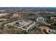 An aerial view of a neighborhood featuring homes with lush trees at 102 Crescent Woode Way, Dallas, GA 30157