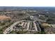 Aerial shot capturing community homes nestled amongst trees in the landscape at 102 Crescent Woode Way, Dallas, GA 30157