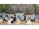 Aerial view of the home showing its location within a well-maintained neighborhood and wooded backdrop at 102 Crescent Woode Way, Dallas, GA 30157