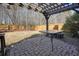 A beautiful backyard patio features hardscaping, and a peaceful ambiance at 102 Crescent Woode Way, Dallas, GA 30157