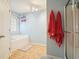 Bathroom featuring a separate shower and bathtub, tiled floor, and window at 102 Crescent Woode Way, Dallas, GA 30157
