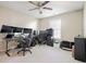 Spacious room with multiple monitors, multiple chairs, and ample desk space for productivity at 102 Crescent Woode Way, Dallas, GA 30157