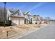 Beautiful two-story home with a well manicured lawn, two car garage, and neutral paint at 102 Crescent Woode Way, Dallas, GA 30157