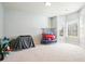 Neutral room with a large window, plenty of natural light, and soothing paint is ready for decor at 102 Crescent Woode Way, Dallas, GA 30157
