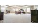 Expansive main bedroom with a tray ceiling, large windows, and abundant space at 102 Crescent Woode Way, Dallas, GA 30157