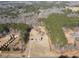 Aerial view of property featuring lush greenery and a long driveway at 172 Lakeview Dr, Newborn, GA 30056