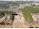 Aerial view of property featuring lush greenery and a long driveway at 172 Lakeview Dr, Newborn, GA 30056