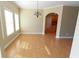 Bright dining room with chandelier, natural light, and hardwood flooring at 172 Lakeview Dr, Newborn, GA 30056