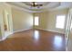 A spacious main bedroom with a ceiling fan and a large window allowing plenty of natural light at 172 Lakeview Dr, Newborn, GA 30056