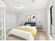 Well-lit bedroom featuring modern decor, closet, and a window for natural light at 3110 Pine Heights Ne Dr, Atlanta, GA 30324