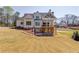Spacious backyard featuring an expansive lawn and a patio area, perfect for outdoor entertaining at 505 Cochran Dr, Norcross, GA 30071