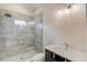 Bathroom featuring a glass shower with modern fixtures, a vanity with a marble countertop, and a toilet at 505 Cochran Dr, Norcross, GA 30071