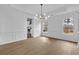 Dining room with modern chandelier and lots of natural light at 9429 Golfview Pt, Villa Rica, GA 30180