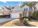 Two-story home with a two-car garage and well-maintained front lawn at 239 Brookhaven Ct, Acworth, GA 30102